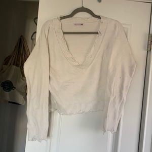 White distressed sweater